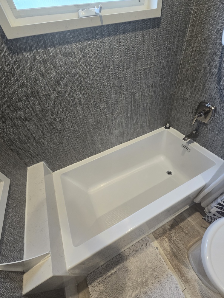 High-angle,View,Of,A,Sleek,White,Acrylic,Bathtub,In,A